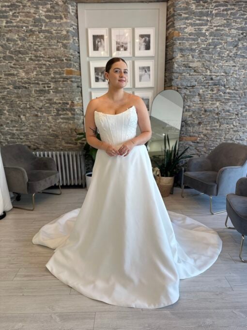 Georgie a matte satin basque waist aline wedding dress. With beaded detail on the corset bodice and in plus size.