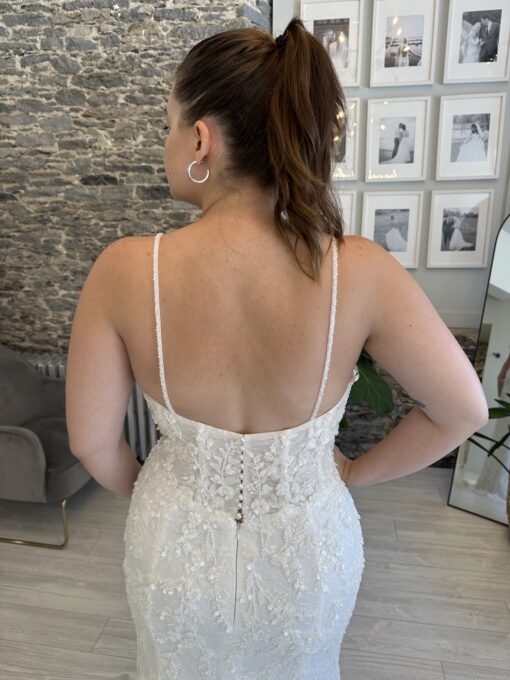 Sonny wedding dress with beading and lace on a fitted gown on a bride at Runway bridal.