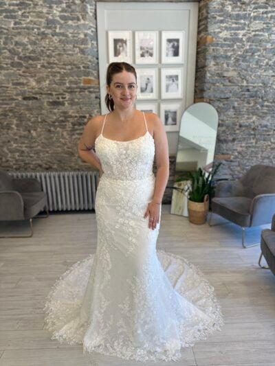 Sonny wedding dress with beading and lace on a fitted gown on a bride at Runway bridal.