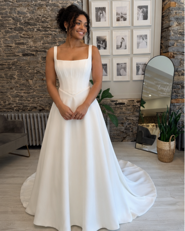 Rivie Satin wedding Dress - Bride wearing the dress at Runway Bridal