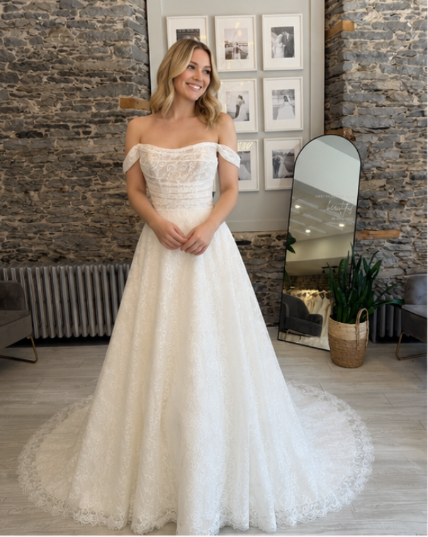Rulla Lace wedding Dress - Bride wearing the dress at Runway Bridal