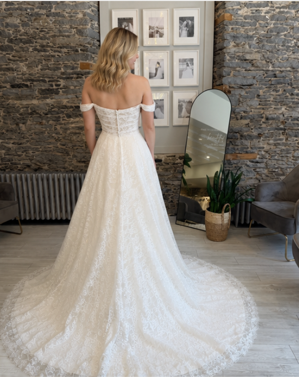 Rulla Lace wedding Dress - Bride wearing the dress at Runway Bridal