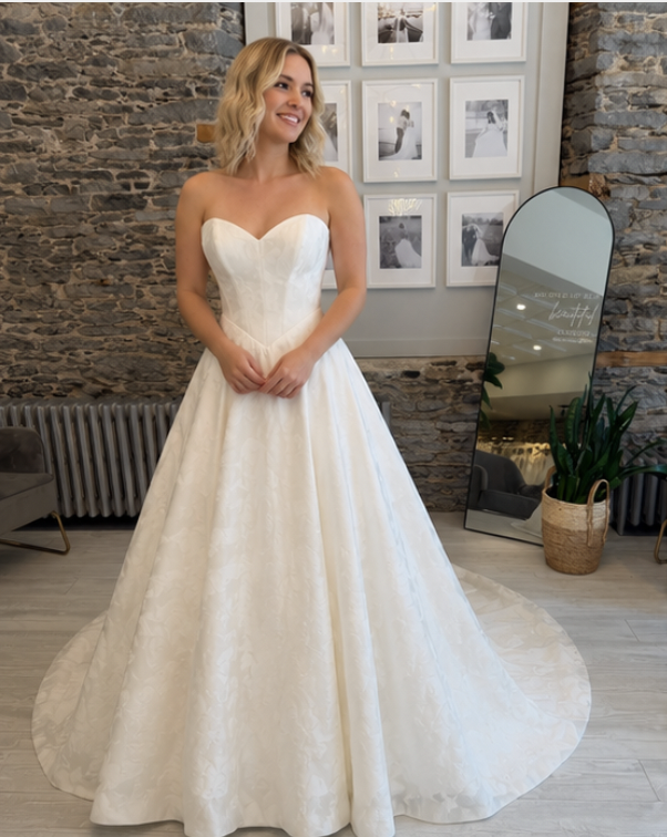 Ryhan Brocade Aline wedding dress on a bride at Runway bridal